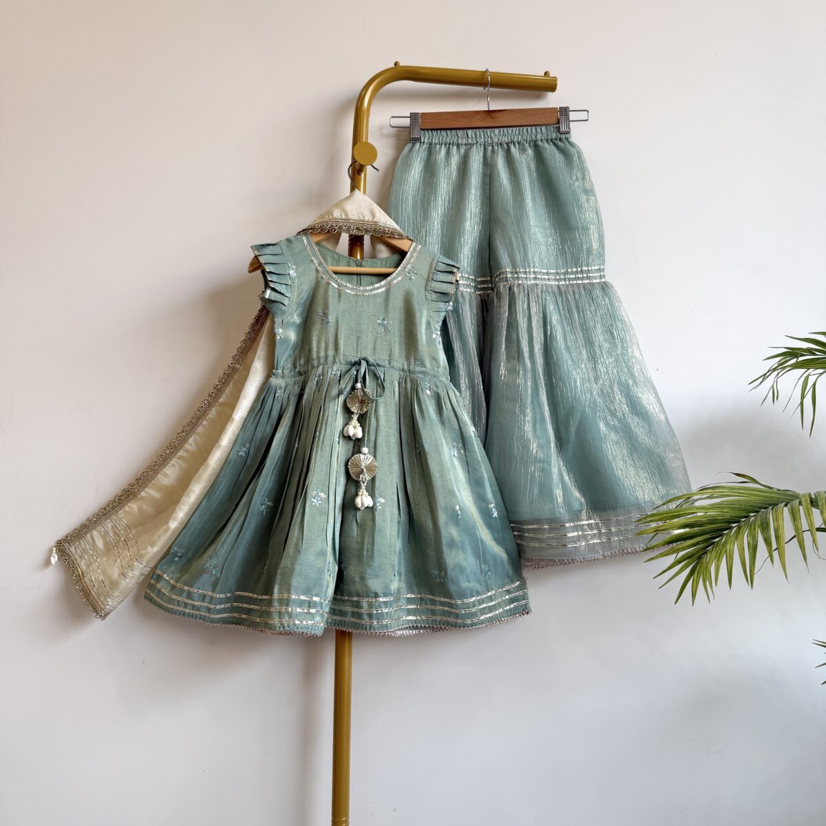 SOFT MINT GREEN PEPLUM TOP AND TISSUE SILK SHARARA SET WITH DUPATTA